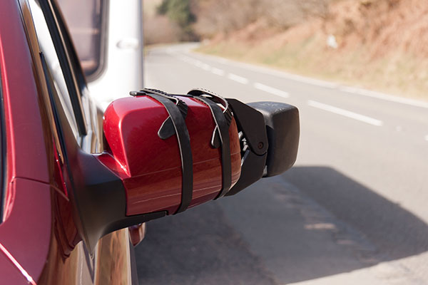 Stabilise towing mirrors